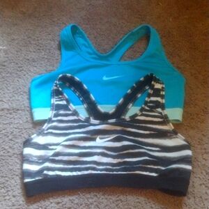 Two Nike sport bras, wrong size and couldn't return.
